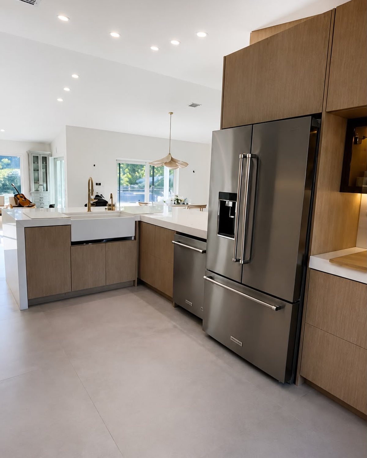 Custom white oak kitchen with island and full-height cabinetry
